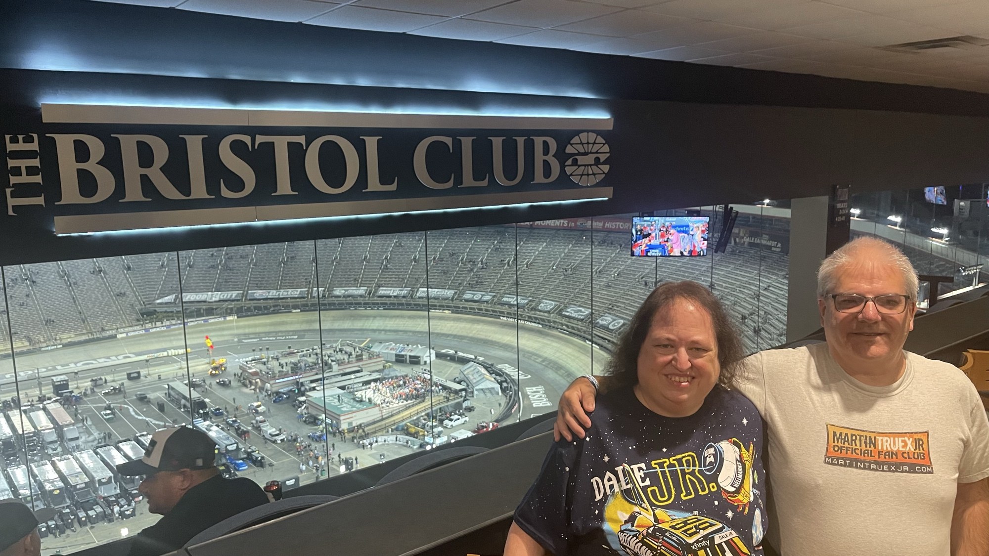 A shared moment at the Bristol Club overlooking the racetrack